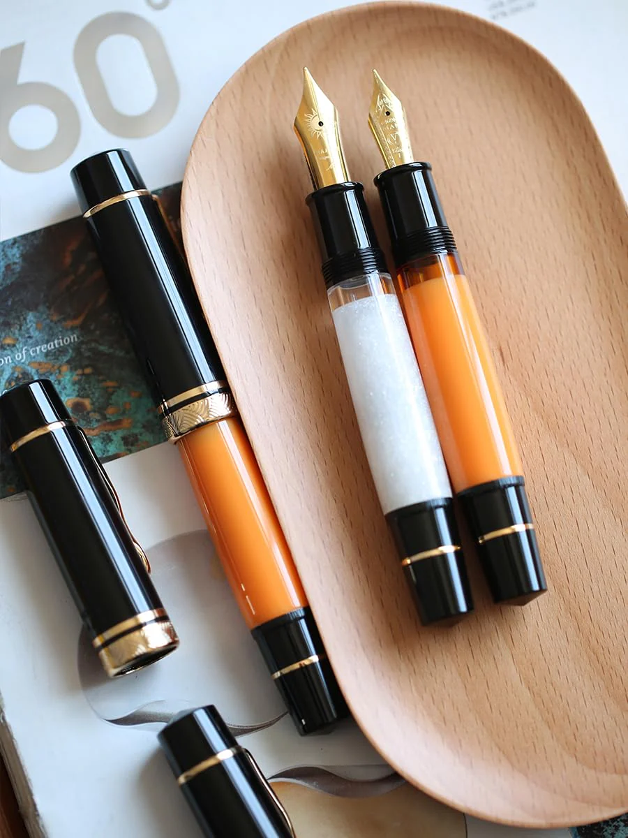Moonman P139 Sun Carved Fountain Pen – Size 8 Nib, Brass Piston System, Large-Capacity Resin Body (Orange & Black) - Image 7